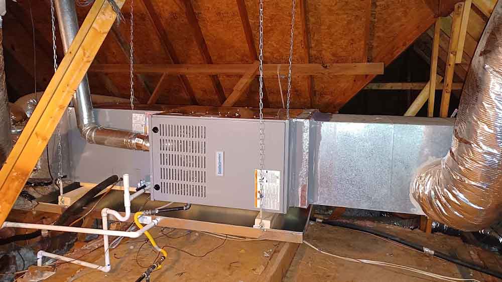 Technician inspecting a heating system Aledo, TX